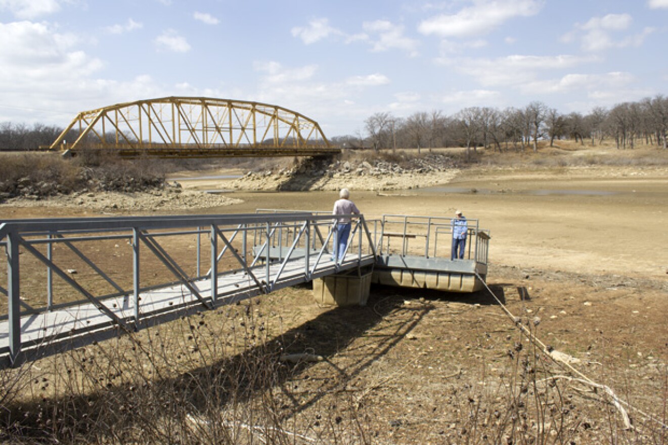 Lisa Davis (right) with the advocacy group Save Lake Texoma near the Rooster Creek Bridge at Lake Texoma State Park.